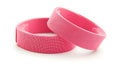 Two pink bands are shown on a white background Royalty Free Stock Photo