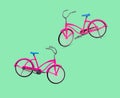 Two pink bicycles on a green background. Royalty Free Stock Photo