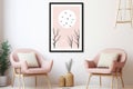 two pink chairs in front of a wall with a painting of birds flying over the moon Royalty Free Stock Photo