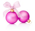 Two pink Christmas baubles with ribbon bow Isolated on white Royalty Free Stock Photo