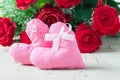 Two pink fabric hearts with red roses Royalty Free Stock Photo