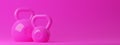 Two pink fitness gym kettlebells on pink background, muscle exercise, bodybuilding or woman`s fitness concept Royalty Free Stock Photo