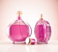 Two pink fragrance bottles