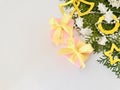 Two Pink gift boxes tied with a yellow ribbons with white background. Royalty Free Stock Photo