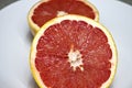 Two pink grapefruit halves Royalty Free Stock Photo