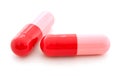 Two Pink and Red Pills Royalty Free Stock Photo