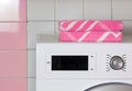 Two Pink Towels on the Top of a Washing Machine Royalty Free Stock Photo