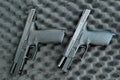 two pistols close-up. 9 millimeters. military weapon . pistol