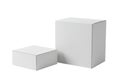 Two blank white cardboard boxes of different sizes isolated on a white background Royalty Free Stock Photo