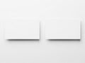 Two plain white rectangular objects standing vertically side by side Royalty Free Stock Photo