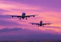 Two planes landing at sunset Royalty Free Stock Photo