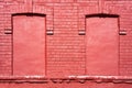 two plastered windows in an old building, red brick and old windows Royalty Free Stock Photo