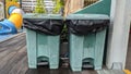 Two plastic bins that looked old and dirty