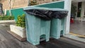 Two plastic bins that looked old and dirty