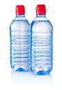 Two plastic bottles of drinking water isolated on white background Royalty Free Stock Photo