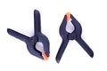 Two plastic clamps on white background