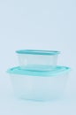 Two plastic food containers with lids. White background Royalty Free Stock Photo