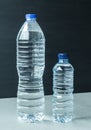 Two plastic water bottles black background Royalty Free Stock Photo