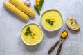 Two plates with traditional autumn spicy corn soup. Vegetarian cuisine Royalty Free Stock Photo