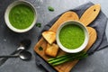Two plates of homemade green cream asparagus soup, vegetarian and vegan food. Top view Royalty Free Stock Photo