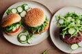 two plates with sandwiches and cucumbers on them on a table top with a knife and fork next to it