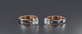 Two platinum rings with diamonds on black background Royalty Free Stock Photo