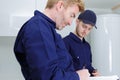 Two plumbers at work Royalty Free Stock Photo