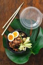 Two poke bowl fried rice chicken meat eggs box top view Asian take away food Royalty Free Stock Photo