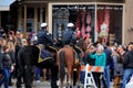 Two police on horses, keeping crowds in check during Chowderfest,Saratoga Springs,New York,2016