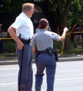 Two police officers discuss evidence at a crime scenein Hyattsville, Maryland