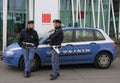 Two police officers are speaking nearly InfoPoint