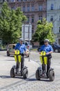 Two policemen patrols on a Segway