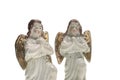 Two porcelain angels isolated on a white background Royalty Free Stock Photo