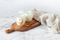 Two portions of joghurt, served on a cutting board, Valentine day breakfast idea
