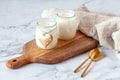 Two portions of joghurt, served on a cutting board, Valentine day breakfast idea Royalty Free Stock Photo