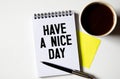 two post-it notes with handwritten HAVE A NICE DAY on them Royalty Free Stock Photo