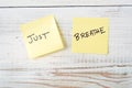 Two Post It Notes with Message Just Breathe Royalty Free Stock Photo