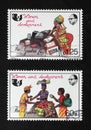 Two stamps from Gambia regarding women and development