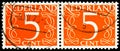 Two postage stamps printed in Netherlands shows Numeral, 5 c - Dutch cent, Numbers serie, circa 1953