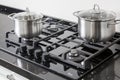 Two pots on a gas stove Royalty Free Stock Photo