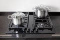 Two pots on a gas stove Royalty Free Stock Photo