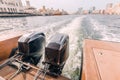 powerful engines at the stern of a cruise ferry boat in the Creek Dubai Canal area overlooking the Deira area