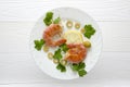 Two prawns on a white plate on a white background Royalty Free Stock Photo