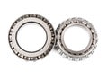 Two precision metal bearings on a white background. top view Royalty Free Stock Photo