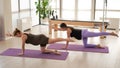 Two pregnant women are doing yoga. Royalty Free Stock Photo