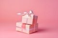 Two present boxes with silk ribbon bow on paslet pink background, mockup, gift card. Holiday concept. Mothers Day, birthday, Royalty Free Stock Photo