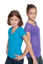 Two preteen girls against the white