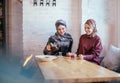 Two caucasian muslim woman drinking tea in cafe Royalty Free Stock Photo