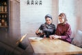 Two caucasian muslim woman drinking tea in cafe Royalty Free Stock Photo