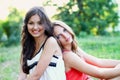 Two pretty smiling caucasian girls